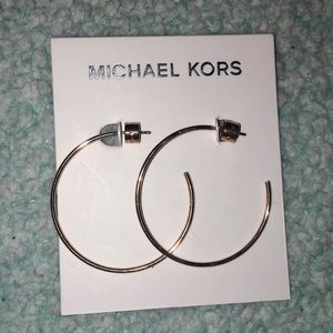 Michael Kors | women's rose gold half hoops